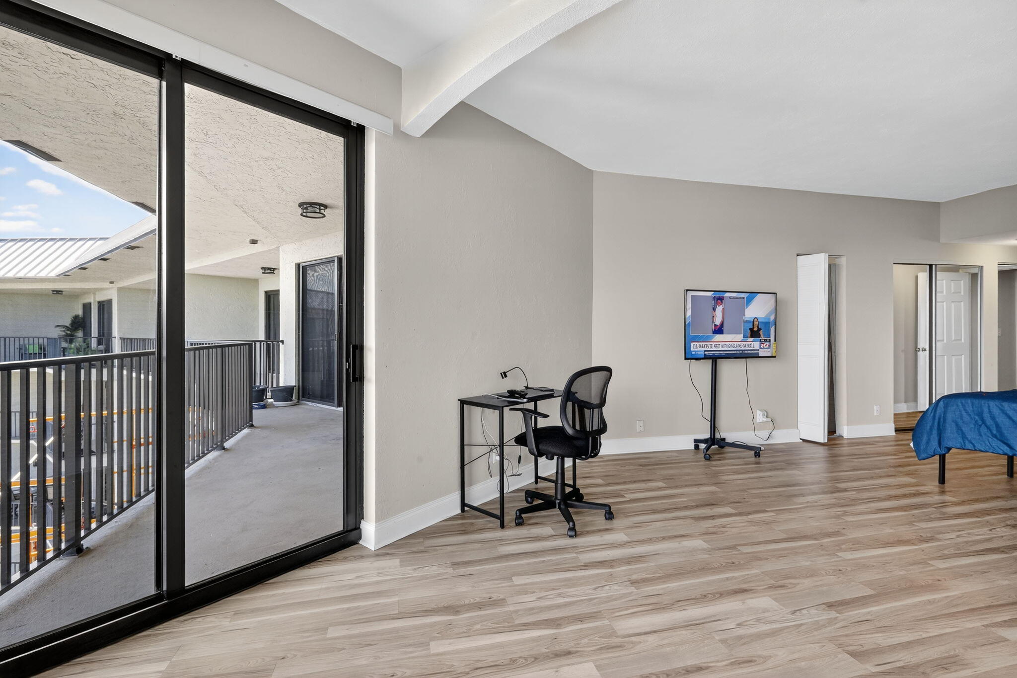 1035 South Federal Highway, Unit PH3 39 Delray Beach, FL 33483 - Photo 21 of 44 a living room with furniture a wooden floor and next to a window