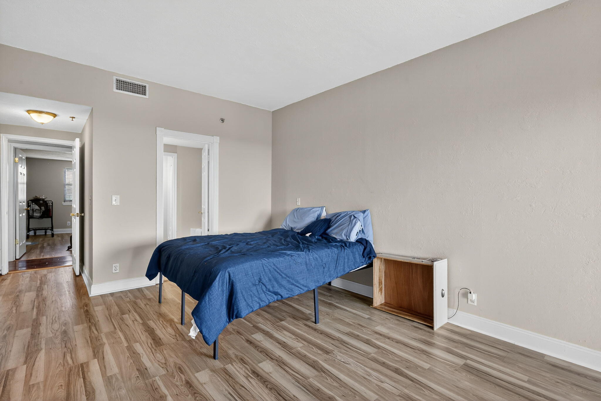 1035 South Federal Highway, Unit PH3 39 Delray Beach, FL 33483 - Photo 22 of 44 a bedroom with a bed and a table