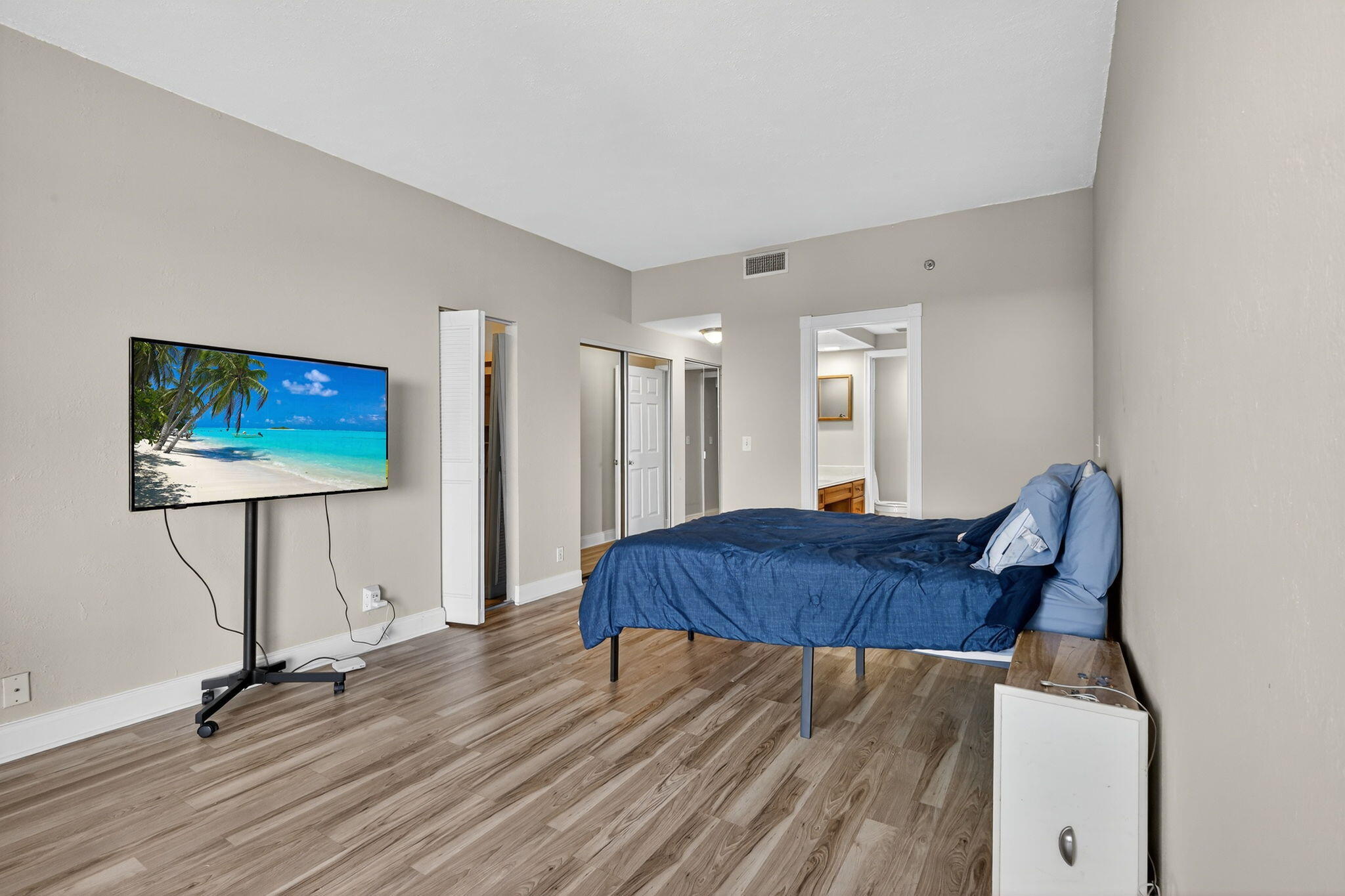 1035 South Federal Highway, Unit PH3 39 Delray Beach, FL 33483 - Photo 23 of 44 a living room with furniture and a flat screen tv