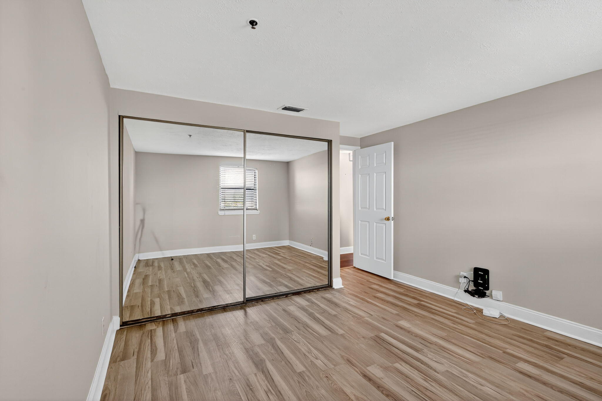 1035 South Federal Highway, Unit PH3 39 Delray Beach, FL 33483 - Photo 27 of 44 a view of empty room with wooden floor