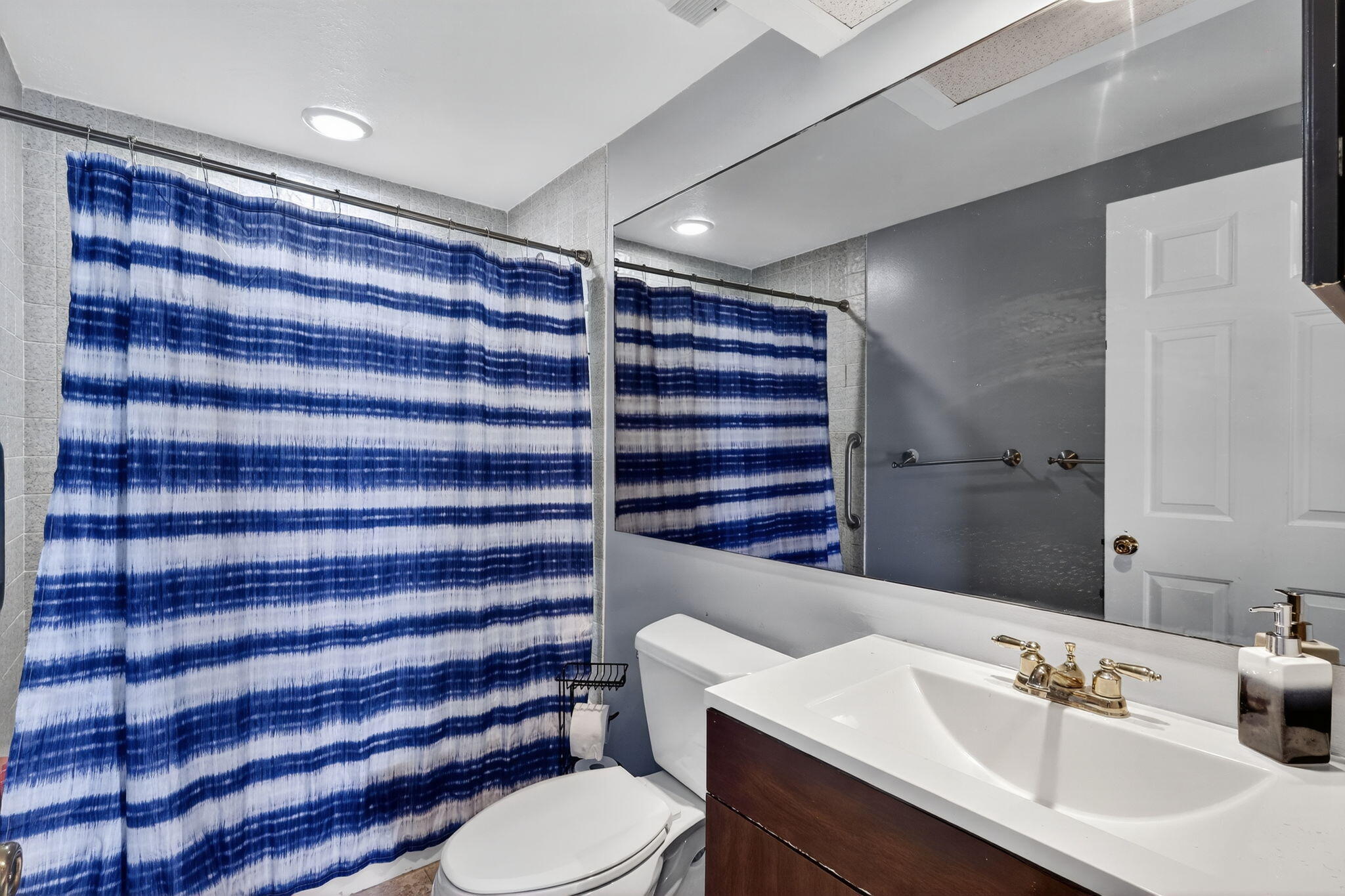 1035 South Federal Highway, Unit PH3 39 Delray Beach, FL 33483 - Photo 29 of 44 a bathroom with a sink toilet and shower