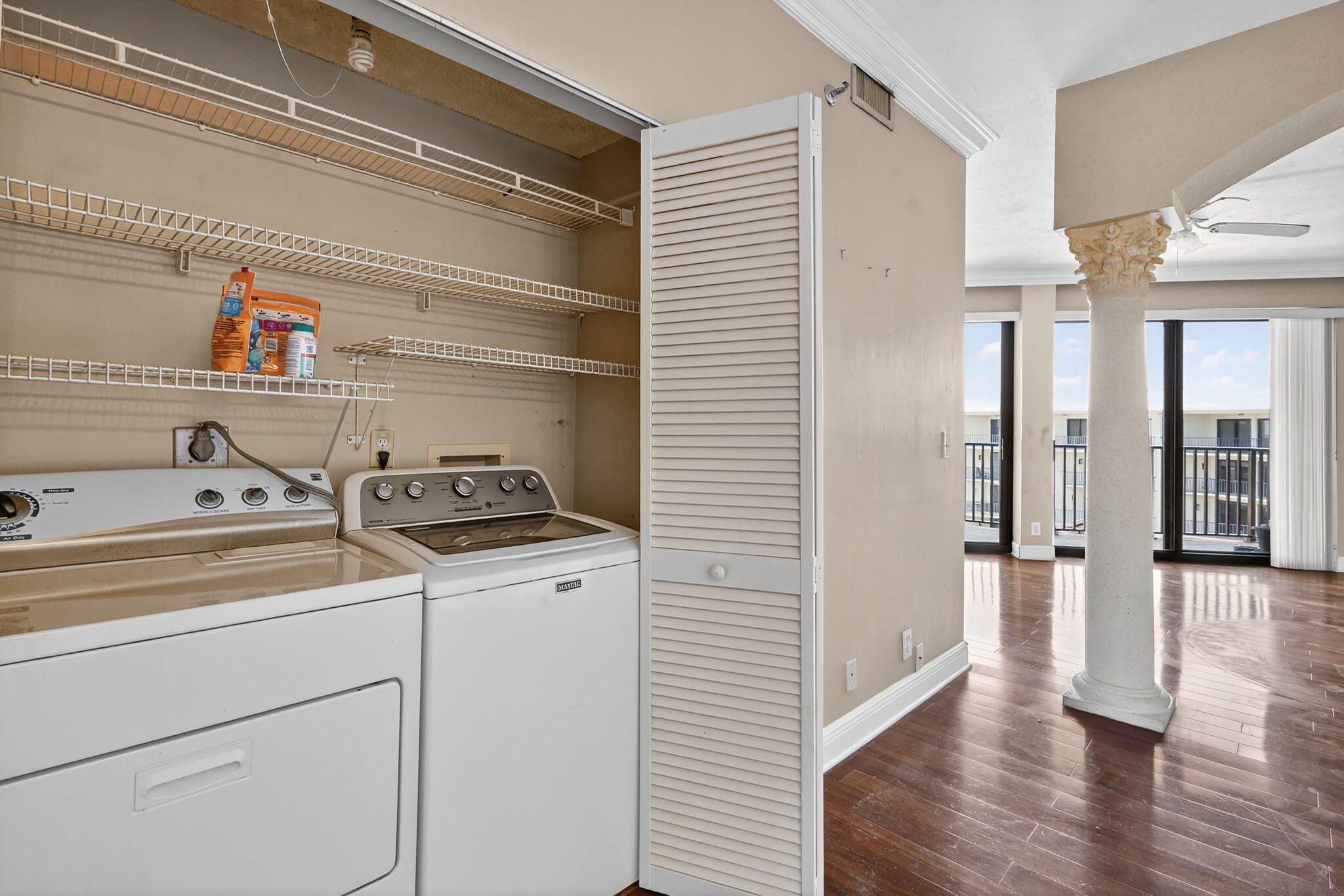 1035 South Federal Highway, Unit PH3 39 Delray Beach, FL 33483 - Photo 31 of 44 a view of walk in closet with clothes and shoes