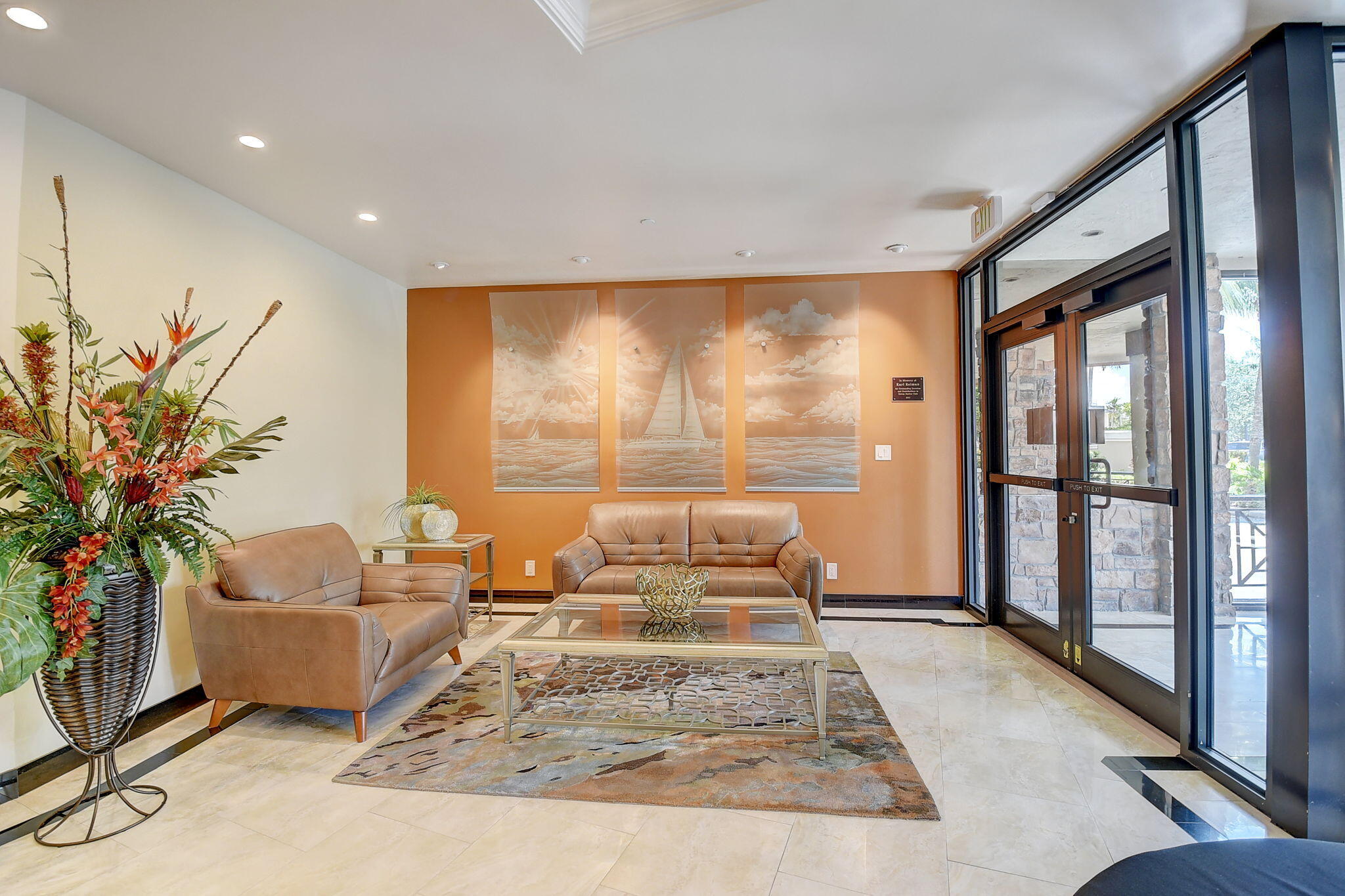 1035 South Federal Highway, Unit PH3 39 Delray Beach, FL 33483 - Photo 32 of 44 a living room with furniture windows and a potted plant