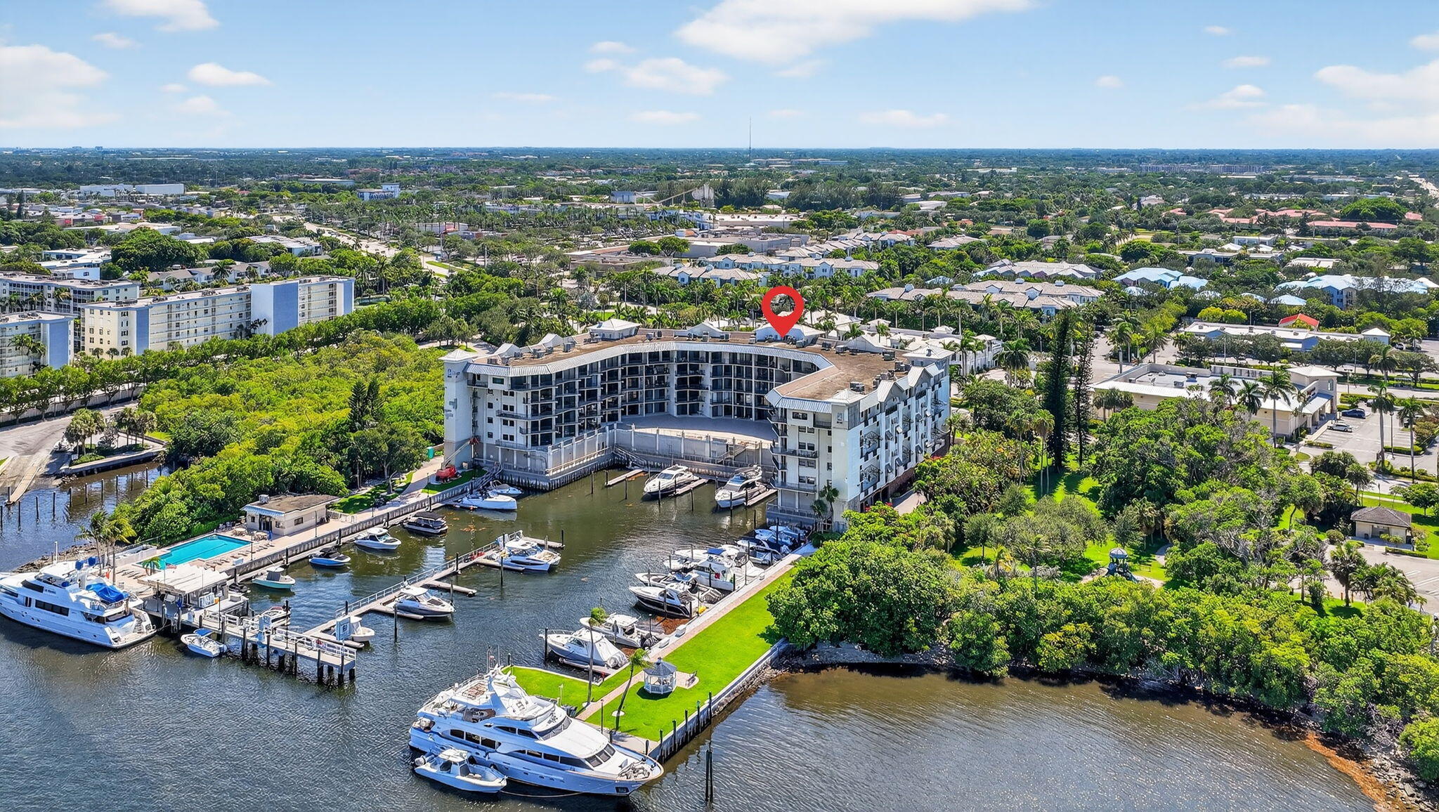 1035 South Federal Highway, Unit PH3 39 Delray Beach, FL 33483 - Photo 5 of 44 an aerial view of a house with a garden and lake view
