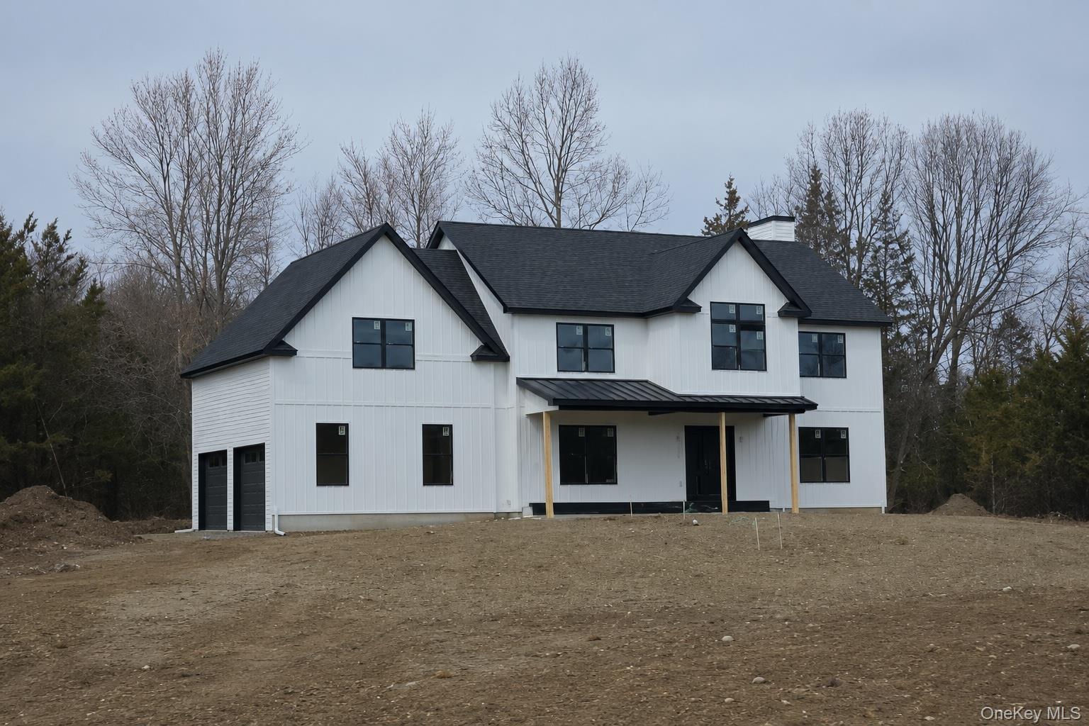 We are building this same home as following photos but with a more modern urban farmhouse look.  This home is up on another site - black windows are an upgrade