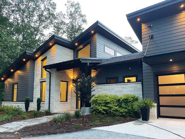 a view of a house with a garage
