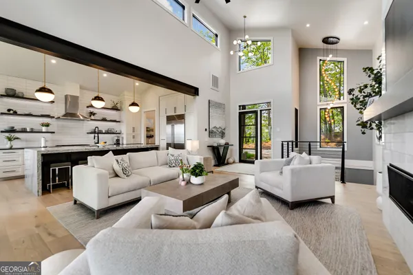 a kitchen with a table and chairs in it