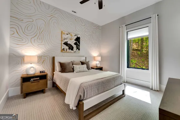 a bedroom with a bed and closet