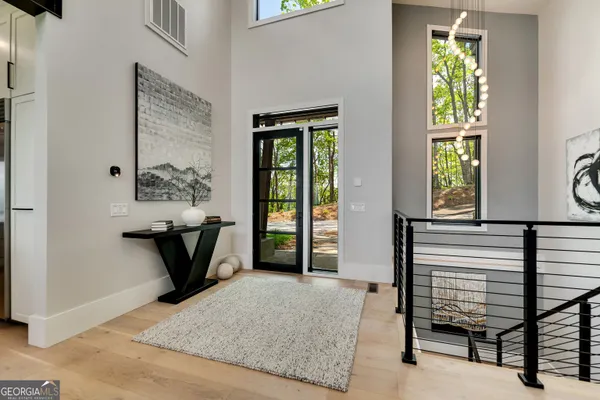 a living room with furniture fireplace and flat screen tv