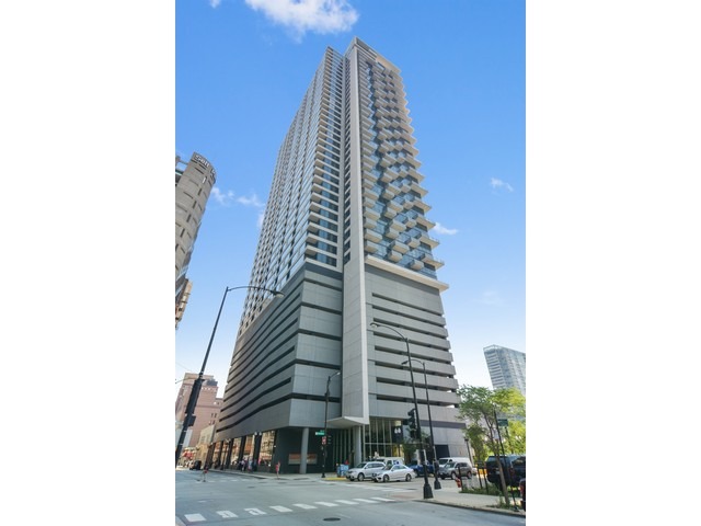 235 West Van Buren Street, Unit 1616 Chicago, IL 60607 - Photo 1 of 16 a view of a tall building