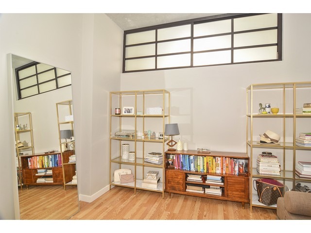 235 West Van Buren Street, Unit 1616 Chicago, IL 60607 - Photo 13 of 16 a view of a living room and workspace