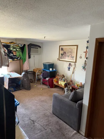 a bathroom with a sink toilet and mirror