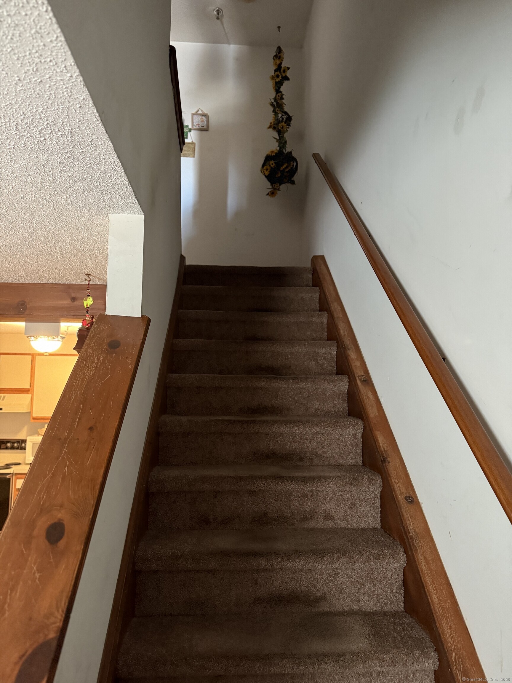 531 Meriden Road, Unit 2 Waterbury, CT 06705 - Photo 10 of 13 a view of entryway and hall with wooden floor