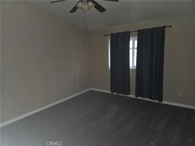 a bathroom with a double vanity sink a mirror and a shower