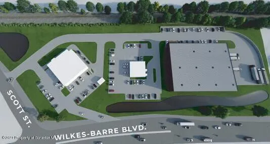 an aerial view of a house with a garden