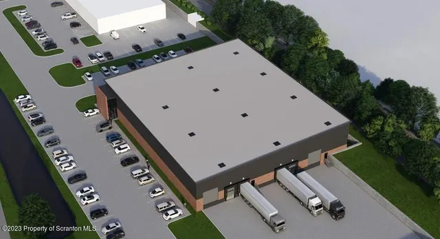 a white bench sitting in the middle of a park