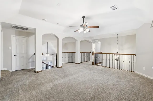 a view of a room with white walls