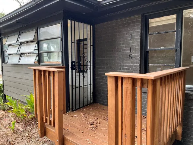 a view of a balcony with door