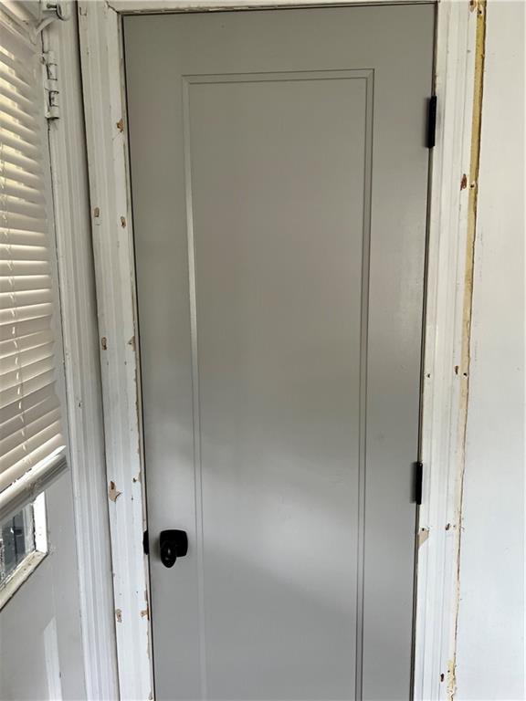 1215 Westview Drive Southwest, Unit A Atlanta, GA 30310 - Photo 22 of 25 a bathroom with a glass shower door