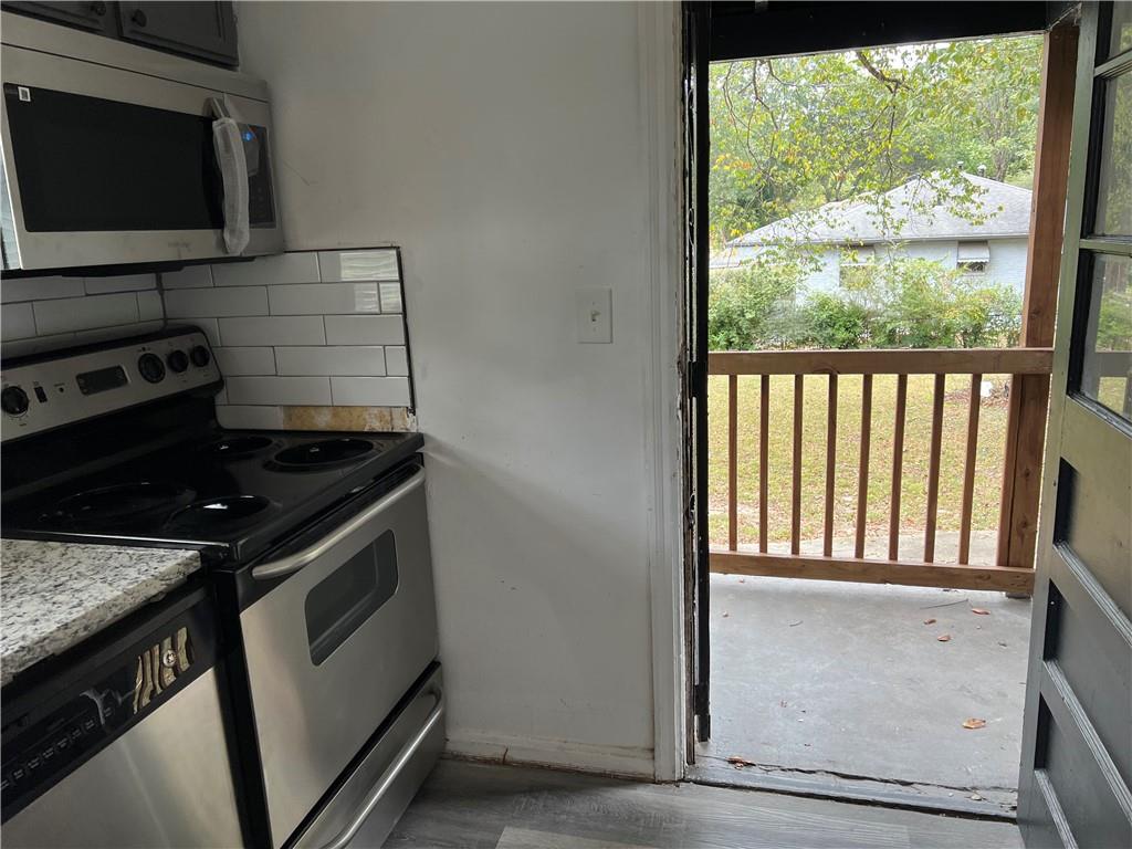 1215 Westview Drive Southwest, Unit A Atlanta, GA 30310 - Photo 23 of 25 a close view of a stove and a microwave