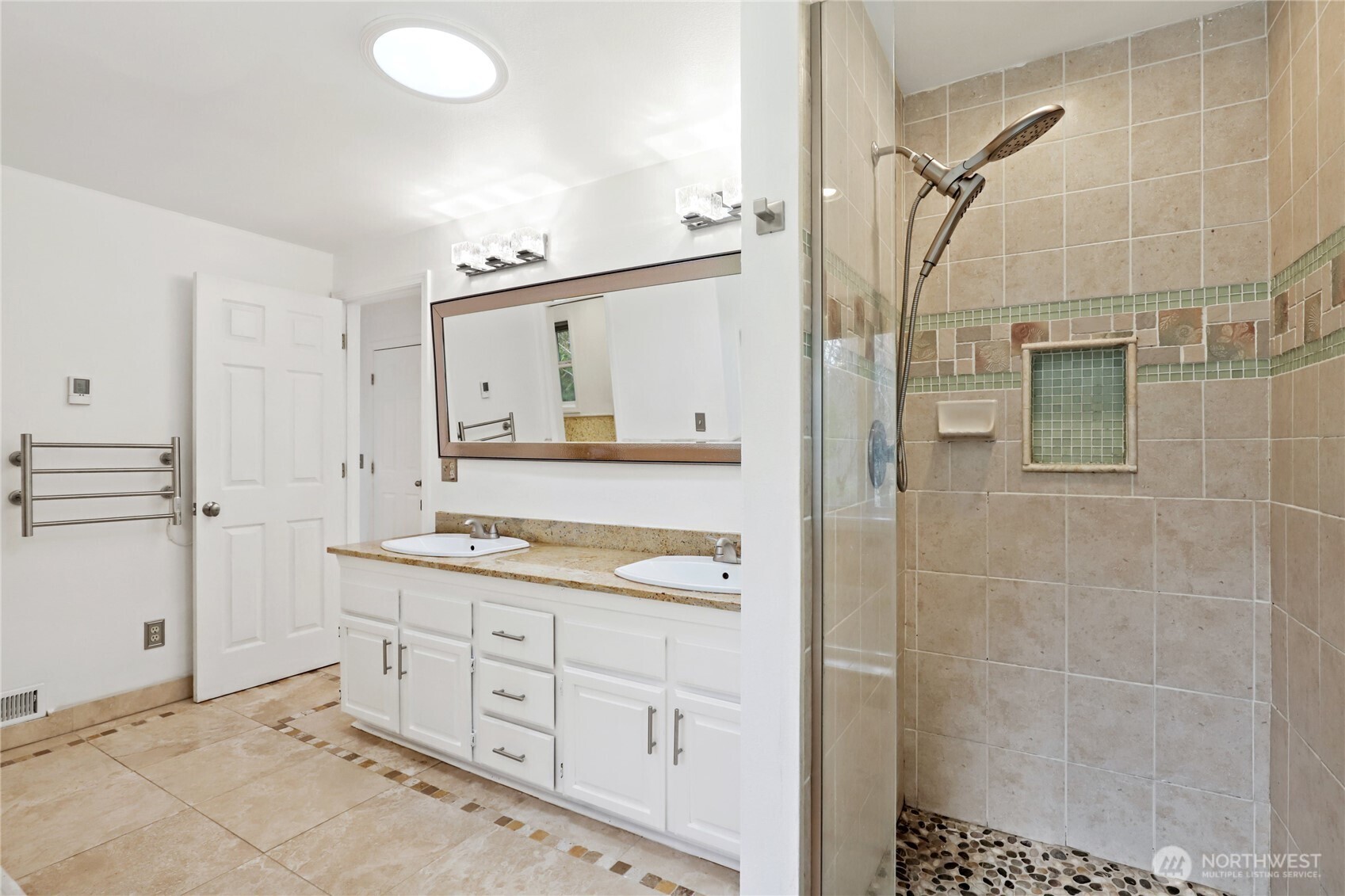 1063 Southwest Depot Court Port Orchard, WA 98367 - Photo 16 of 40 a bathroom with a granite countertop sink a mirror and a shower