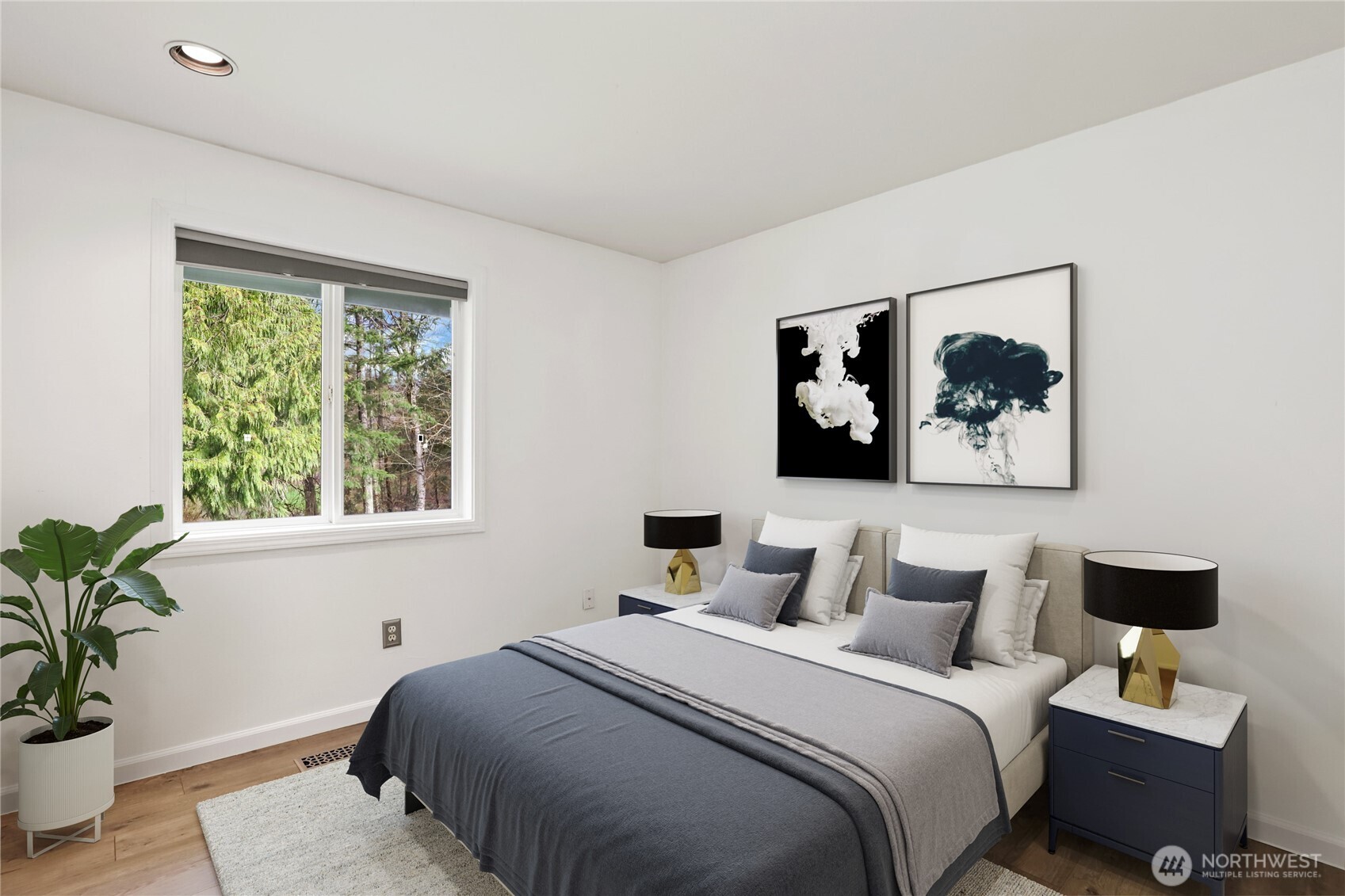 1063 Southwest Depot Court Port Orchard, WA 98367 - Photo 19 of 40 a bedroom with a bed and a painting on the wall
