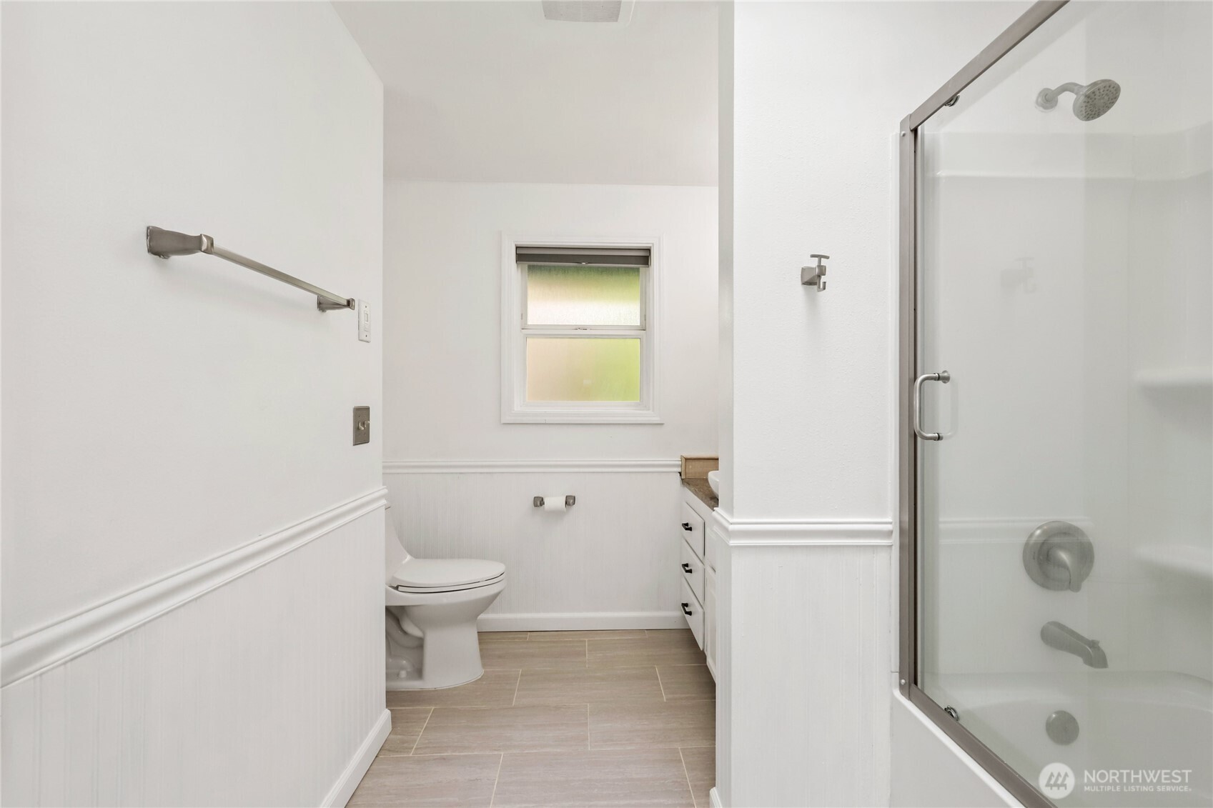 1063 Southwest Depot Court Port Orchard, WA 98367 - Photo 23 of 40 a bathroom with a granite countertop sink a toilet and shower
