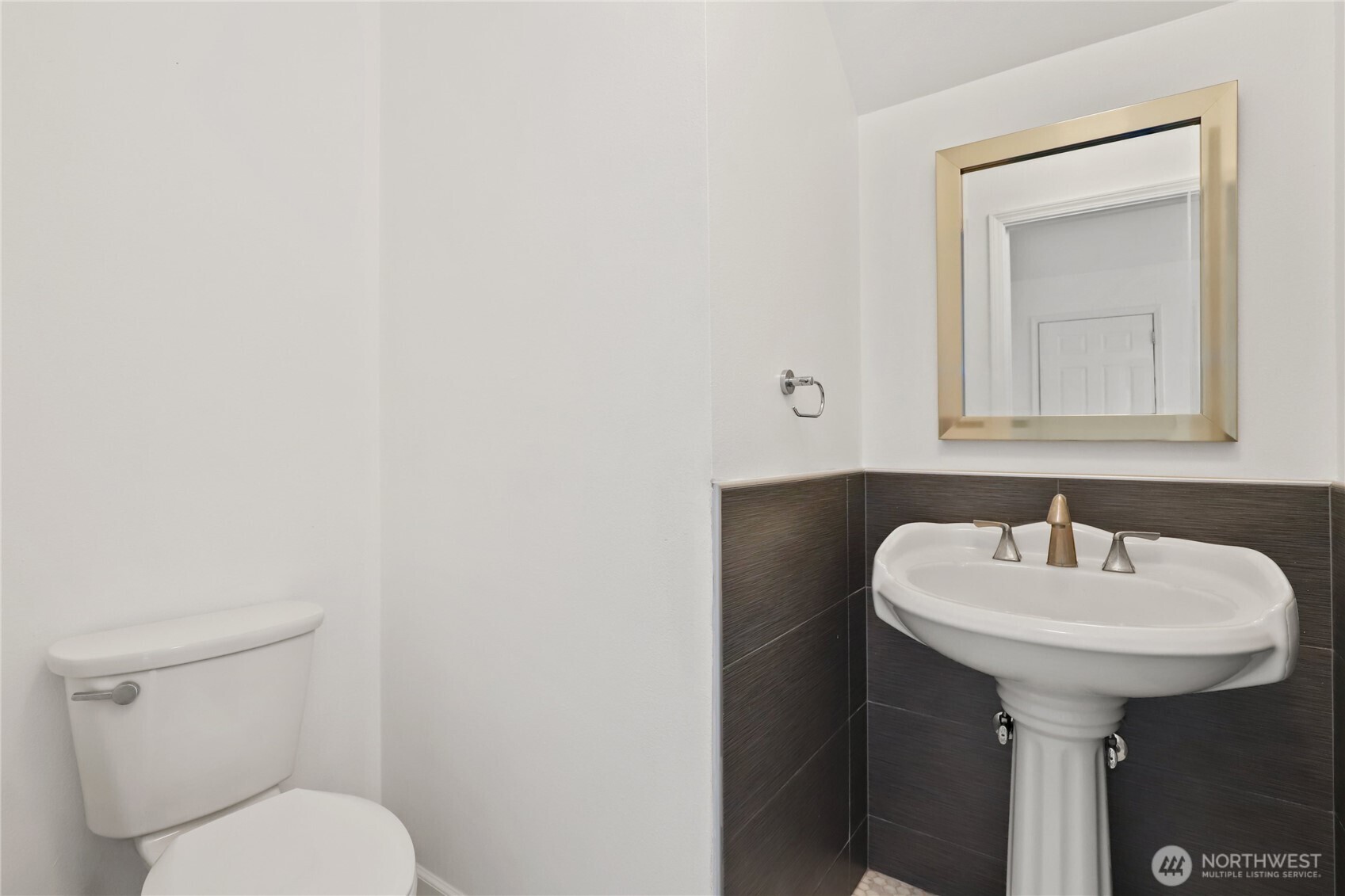 1063 Southwest Depot Court Port Orchard, WA 98367 - Photo 28 of 40 a bathroom with a sink toilet and mirror