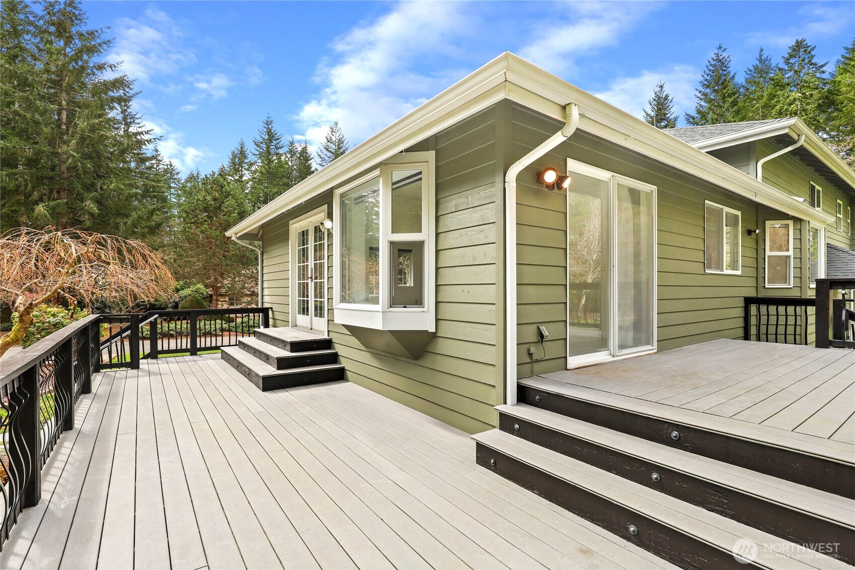 1063 Southwest Depot Court Port Orchard, WA 98367 - Photo 29 of 40 a view of a house with a deck