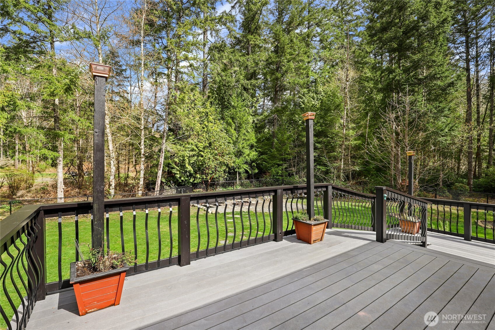 1063 Southwest Depot Court Port Orchard, WA 98367 - Photo 30 of 40 a view of a street with a deck