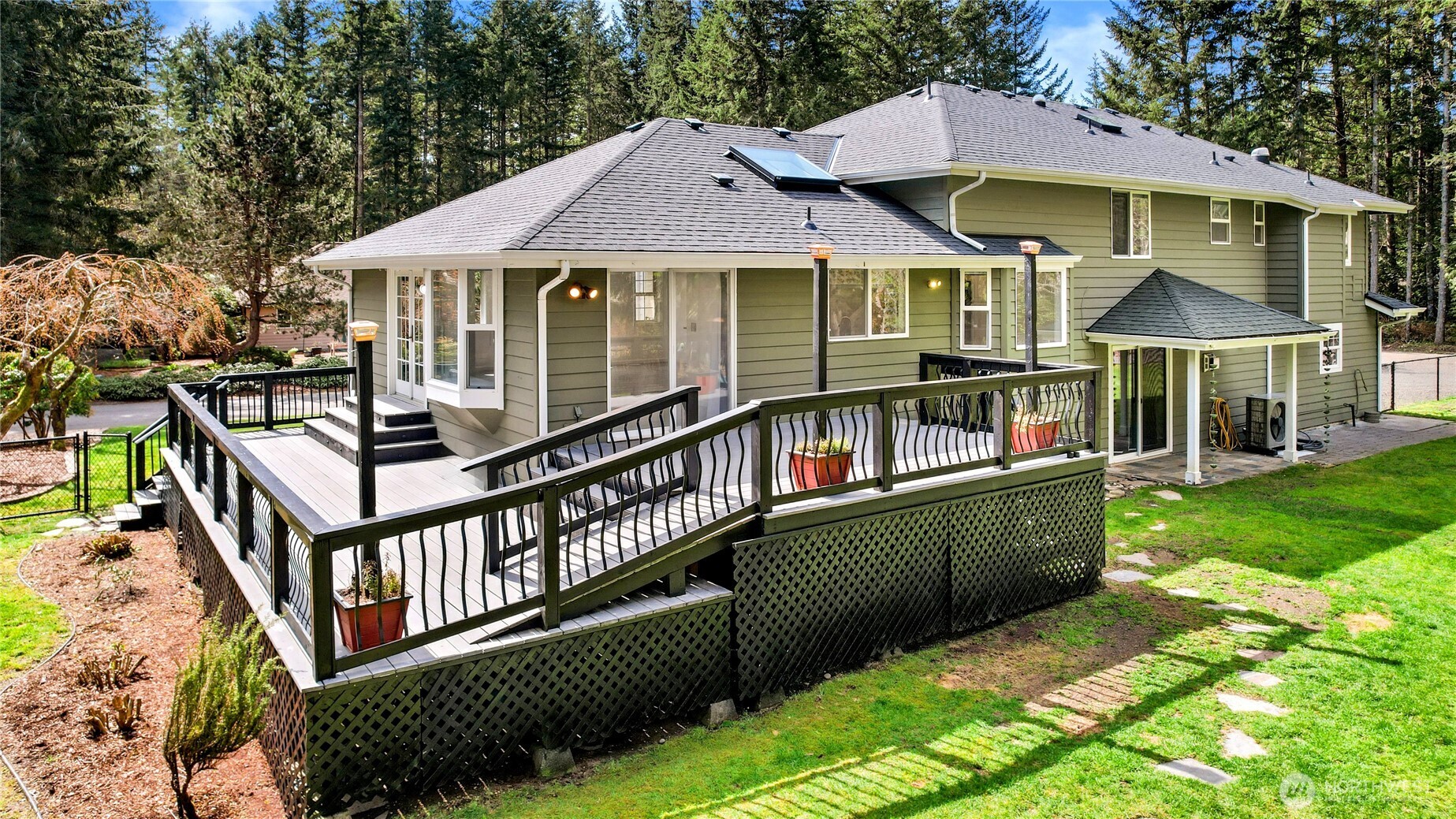 1063 Southwest Depot Court Port Orchard, WA 98367 - Photo 31 of 40 a view of a house with swimming pool and porch