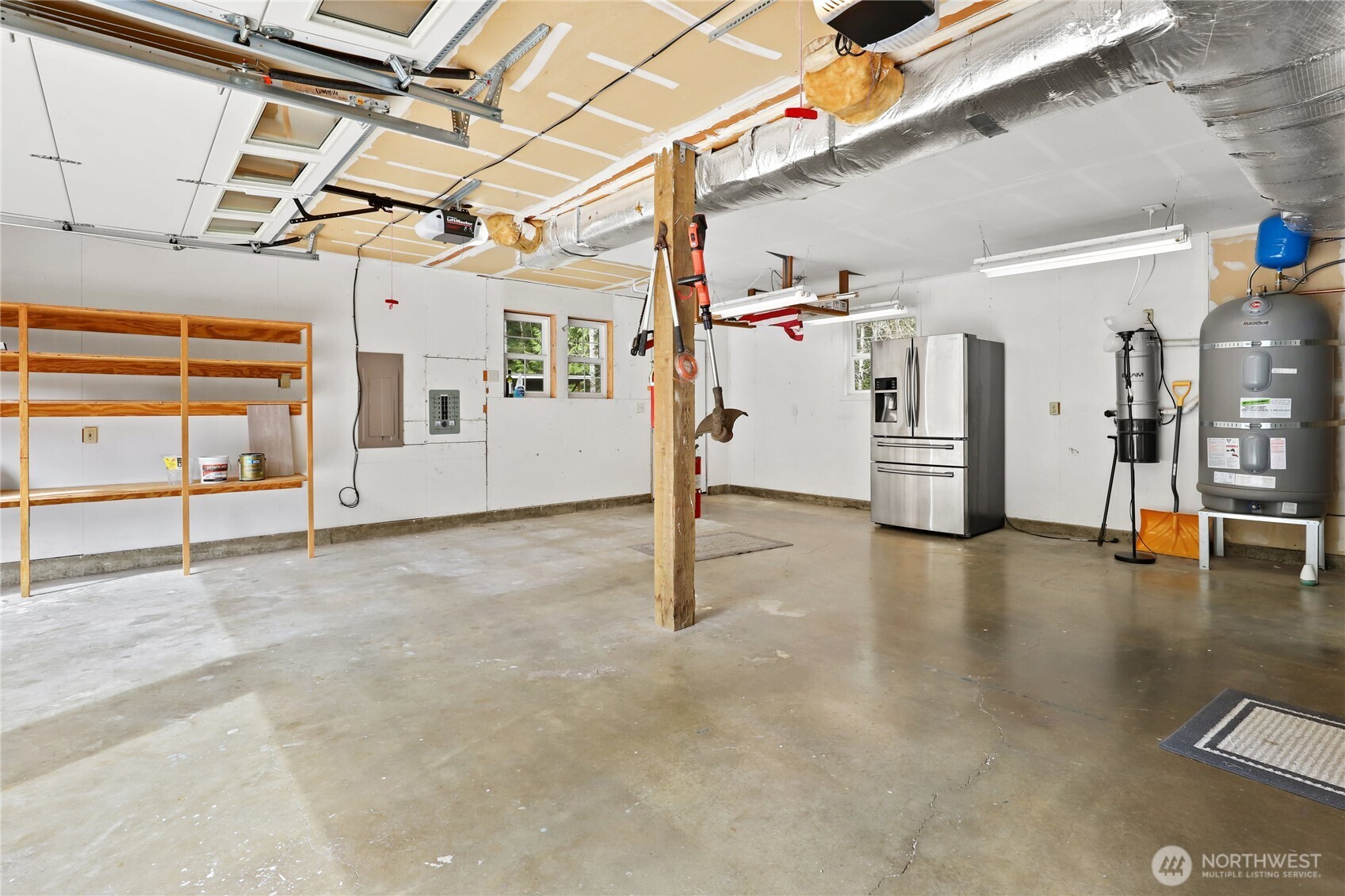 1063 Southwest Depot Court Port Orchard, WA 98367 - Photo 37 of 40 a view of a room with wooden walls