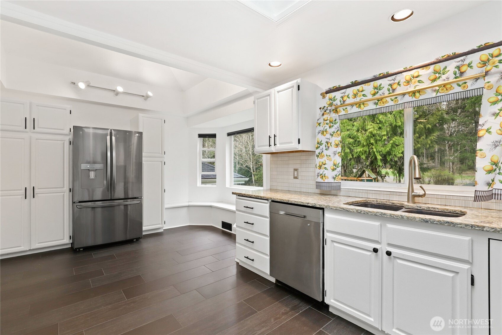 1063 Southwest Depot Court Port Orchard, WA 98367 - Photo 10 of 40 a kitchen with a sink window and refrigerator