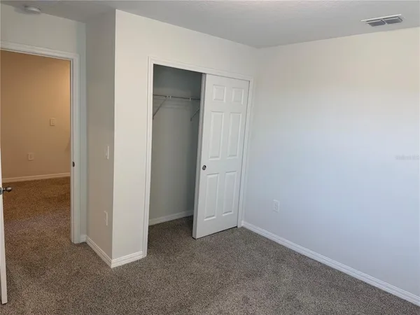 an empty room with closet