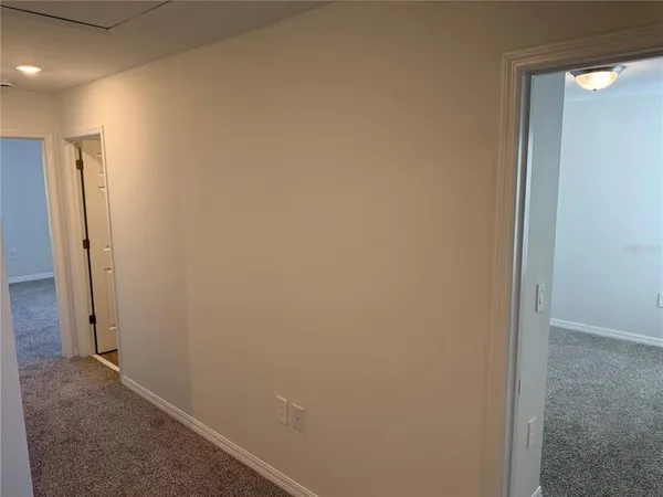 a view of hallway with painted walls