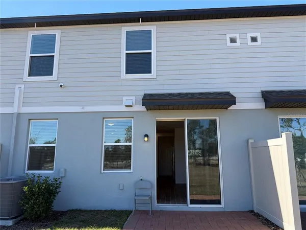 a front view of a house with a small porch