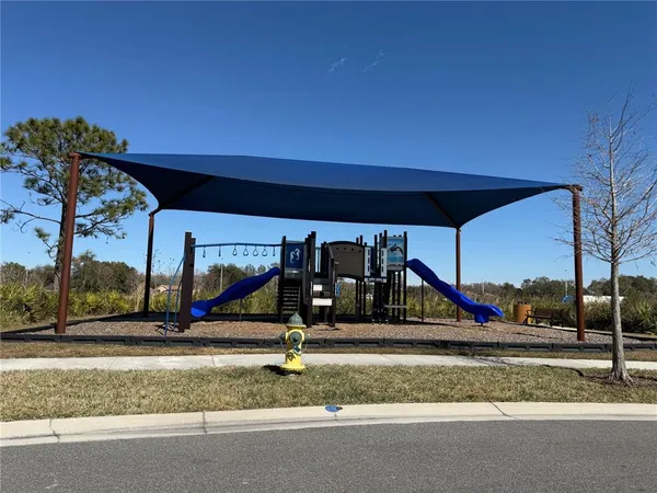a view of park with slide