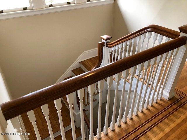 5 Brookridge Drive Greenwich, CT 06830 - Photo 12 of 17 a view of staircase with railing and a window