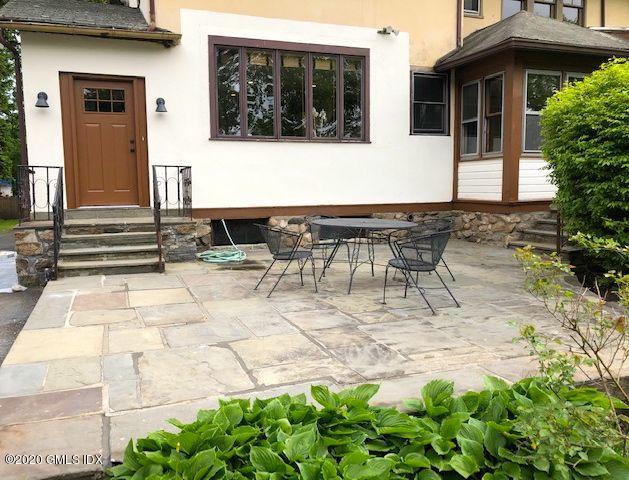 5 Brookridge Drive Greenwich, CT 06830 - Photo 4 of 17 a view of house with patio outdoor seating