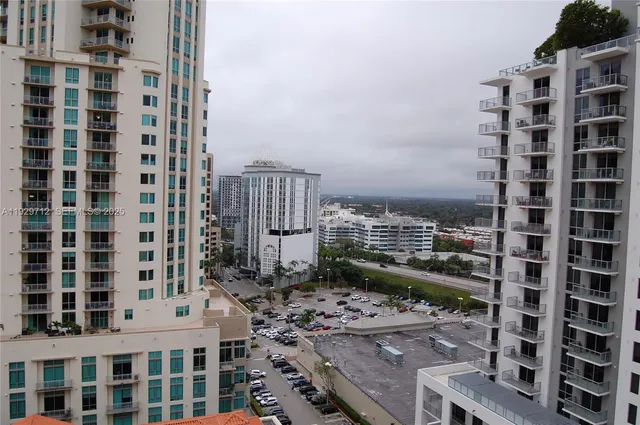 a view of a city with tall buildings