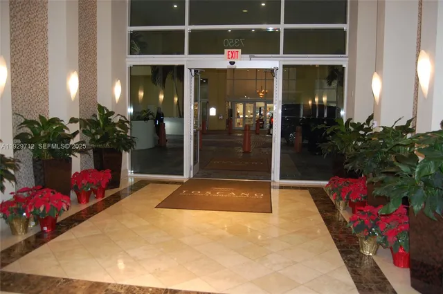 a backyard of a house with flower pots