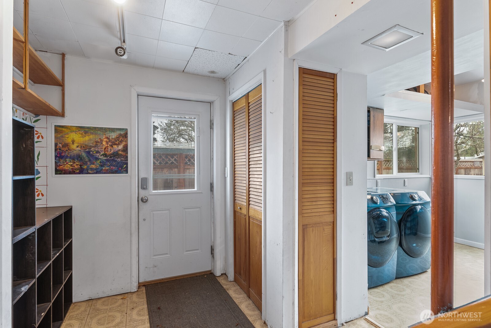 1705 36th Street Anacortes, WA 98221 - Photo 11 of 39 a view of hallway with wooden floor and furniture