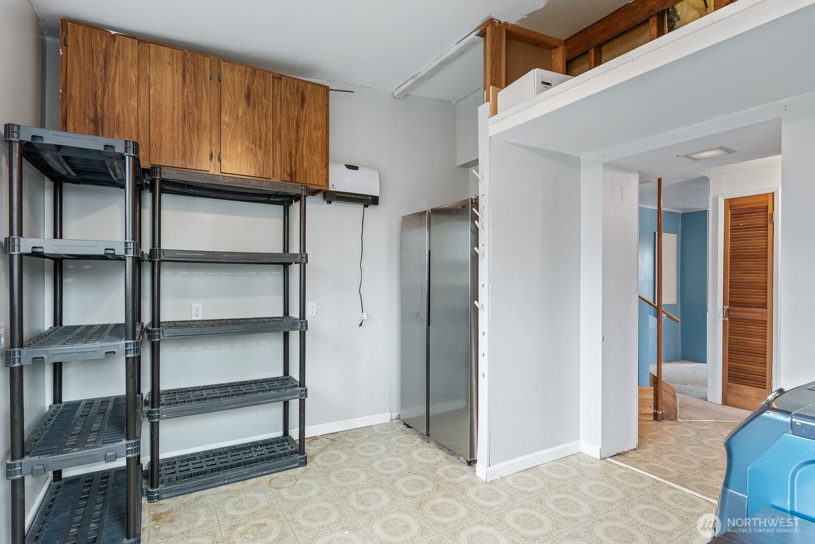 1705 36th Street Anacortes, WA 98221 - Photo 13 of 39 a view of an empty room with cabinet and a window
