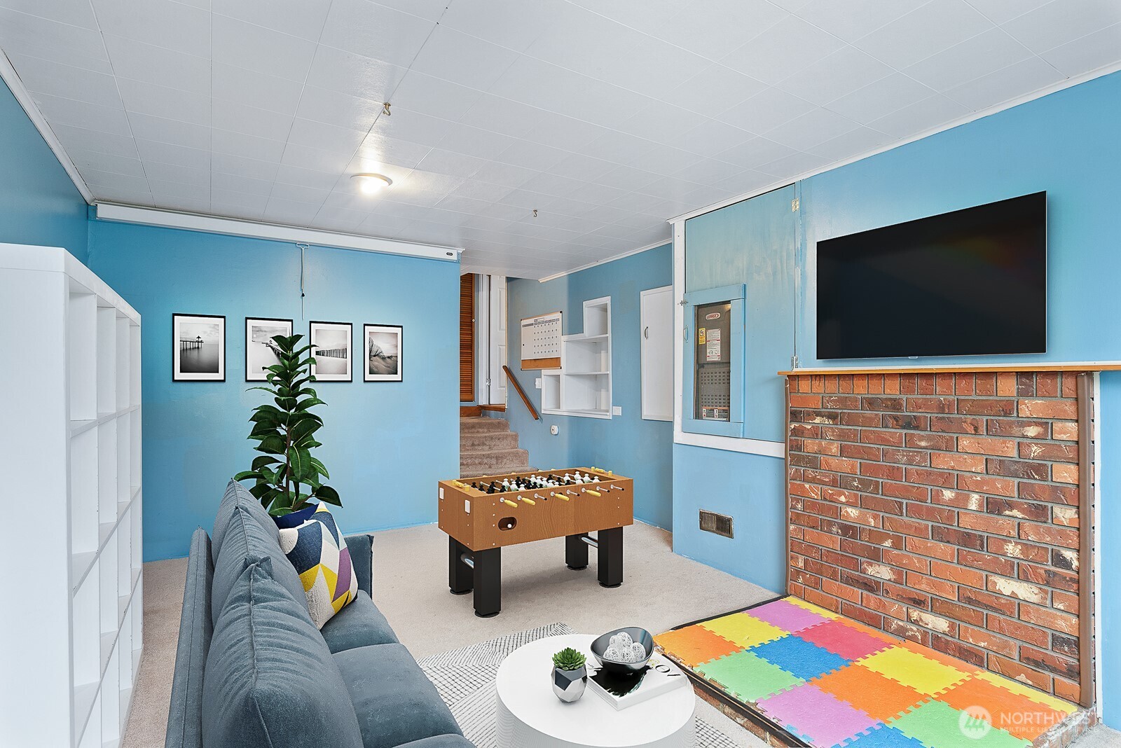 1705 36th Street Anacortes, WA 98221 - Photo 9 of 39 a living room with furniture and a flat screen tv