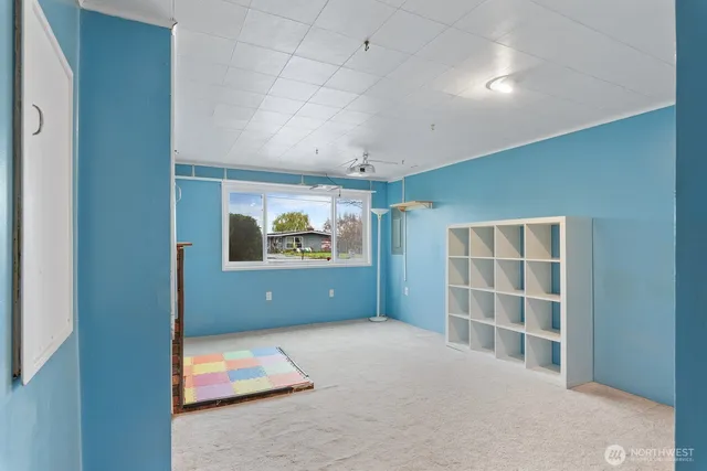 a view of a room with shelves