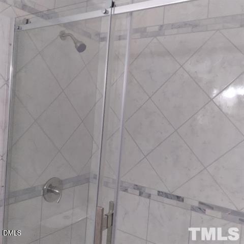 1015 Holmes Street Raleigh, NC 27601 - Photo 12 of 12 a bathroom with a shower