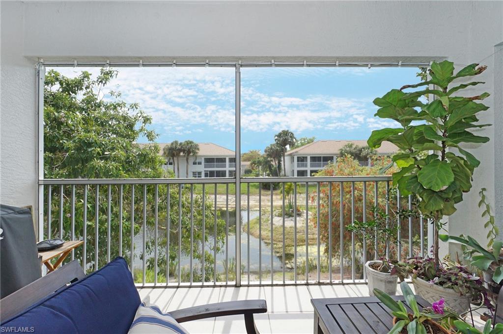 6910 Satinleaf Road North, Unit 204 Naples, FL 34109 - Photo 8 of 31 View of balcony