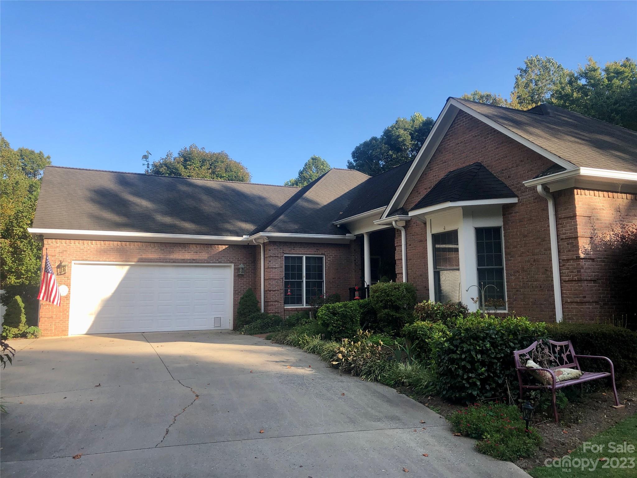 213 Forest Ridge Drive Rutherfordton, NC 28139 - Photo 1 of 5 a front view of a house with a yard