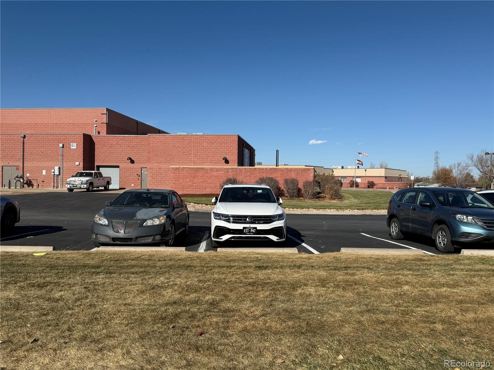 623 Prairie Avenue Brighton, CO 80603 - Photo 33 of 35 a car parked on the side of the road