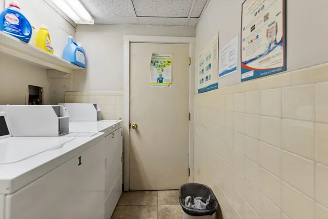 a bathroom with a sink and a white door